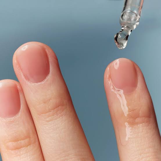 Cuticle care oil applied at home